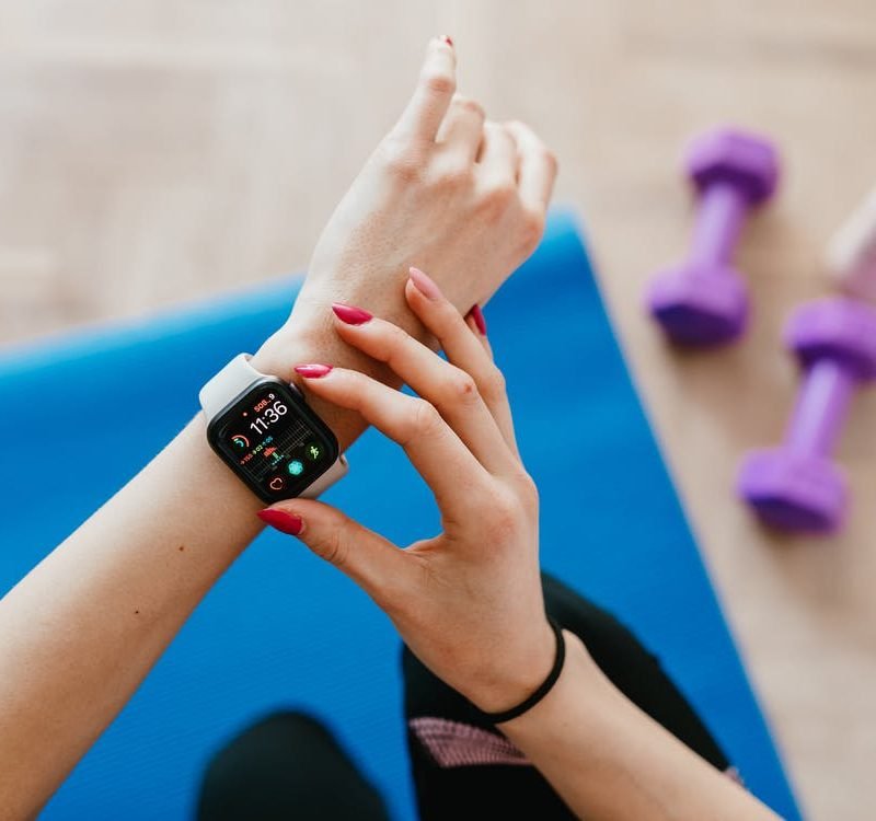 lady checking fitness watch