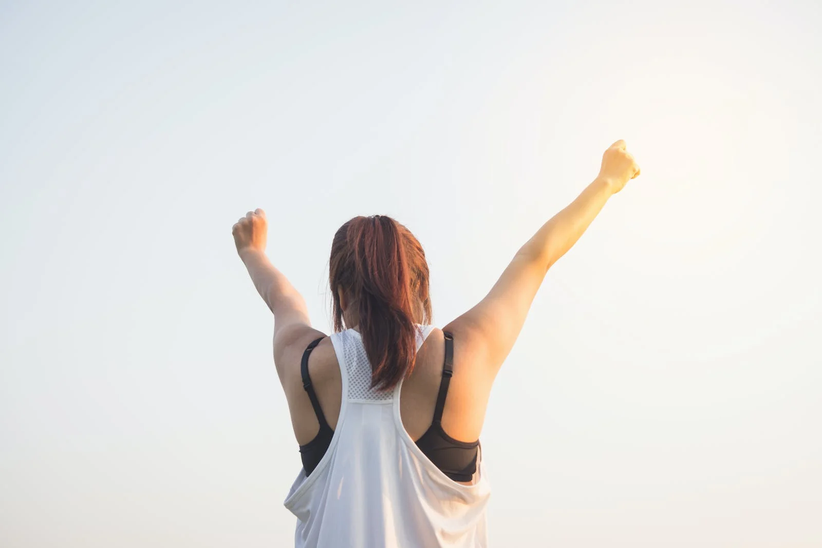 lady celebrating after workout